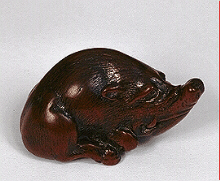 Masatomo wood netsuke of a boar, 19th century.  Signed: Masatomo, Nagoya.