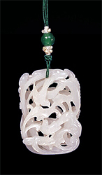 White Nephrite Pendant carved and pierced throughout with two birds feeding amongst Ruri fungus.